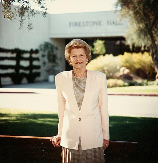 Betty Ford poses for her picture in front of firestone hall