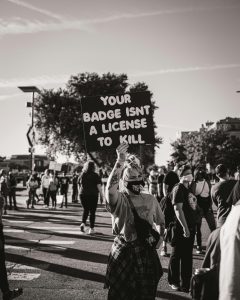 A person holding a sign.